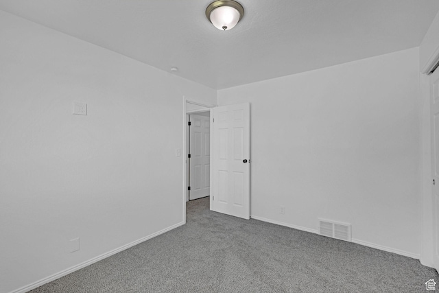 181 E 5150 S, Washington Terrace, UT 84405 - carpeted empty room with baseboards