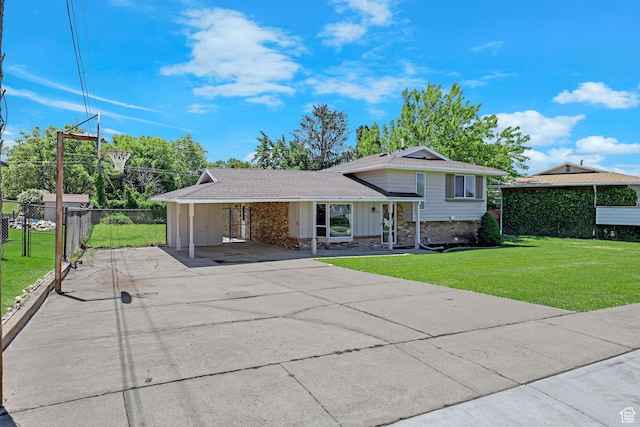 181 E 5150 S, Washington Terrace, UT 84405 - tri-level home featuring concrete driveway, an attached carport, board and batten siding, and roof with shingles
