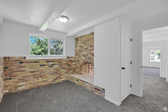 181 E 5150 S, Washington Terrace, UT 84405 - empty room featuring carpet, a textured ceiling, and beamed ceiling