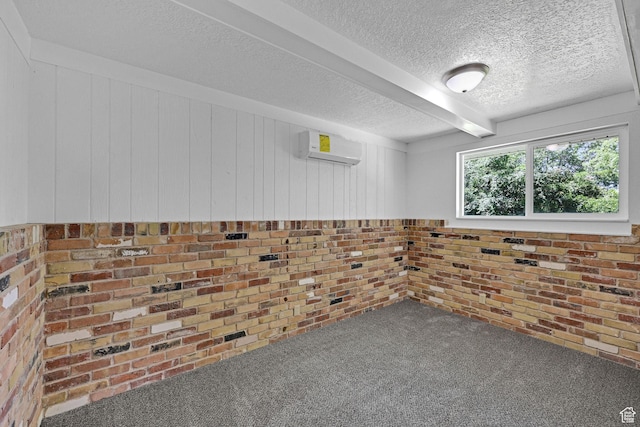 181 E 5150 S, Washington Terrace, UT 84405 - spare room featuring a wall mounted AC, carpet flooring, a textured ceiling, and wood walls