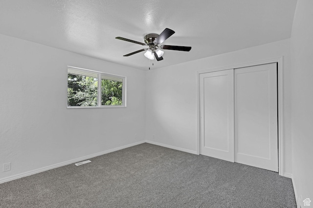 181 E 5150 S, Washington Terrace, UT 84405 - unfurnished bedroom with carpet, ceiling fan, a closet, and baseboards