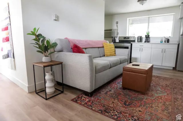 751 E Scott Ave, Millcreek, UT 84106 - living room with light wood-style floors