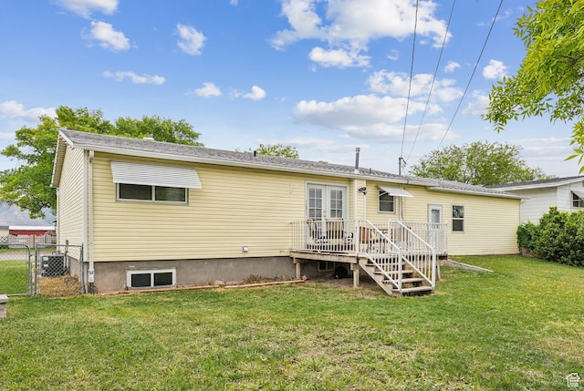 981 N Tremont St, Tremonton, UT 84337 - rear view of house featuring central AC unit and a gate
