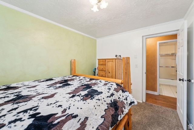 981 N Tremont St, Tremonton, UT 84337 - bedroom featuring crown molding, a textured ceiling, carpet flooring, and baseboards