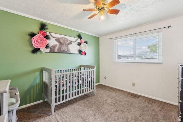 981 N Tremont St, Tremonton, UT 84337 - bedroom with a textured ceiling, a nursery area, ornamental molding, carpet flooring, and baseboards