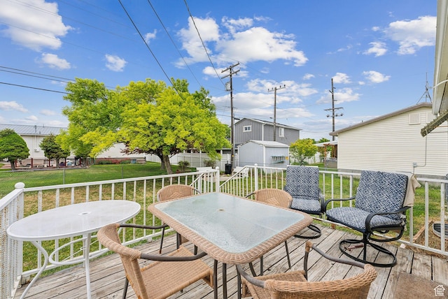 981 N Tremont St, Tremonton, UT 84337 - wooden deck with outdoor dining area