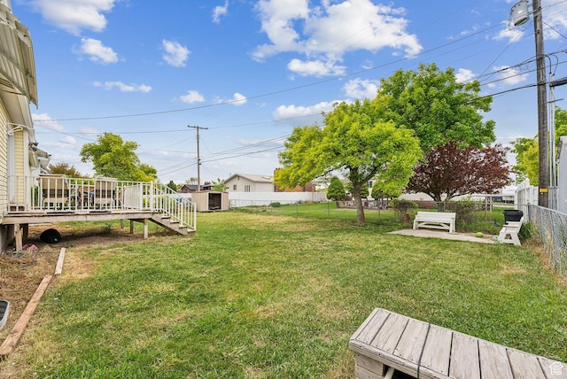 981 N Tremont St, Tremonton, UT 84337 - view of yard with a deck and stairway