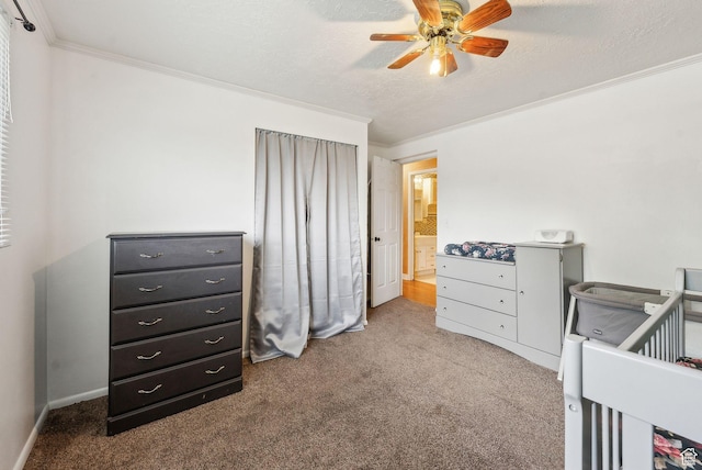 981 N Tremont St, Tremonton, UT 84337 - carpeted bedroom featuring ornamental molding, baseboards, ceiling fan, and a textured ceiling
