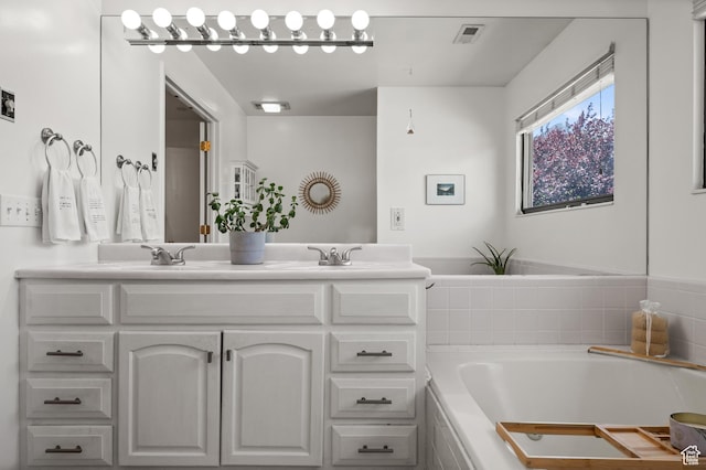 8848 S Willow Hills Ct, Sandy, UT 84093 - bathroom with double vanity and a garden tub