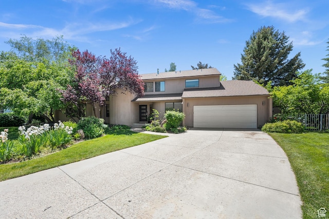 8848 S Willow Hills Ct, Sandy, UT 84093 - view of front facade with a garage, driveway, and roof with shingles