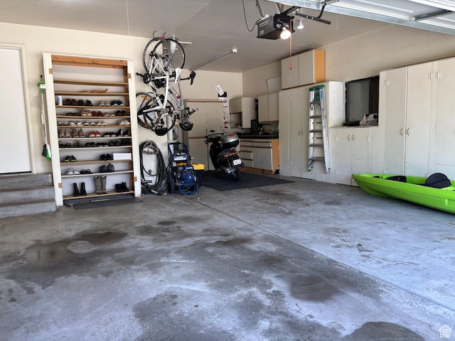 8848 S Willow Hills Ct, Sandy, UT 84093 - garage featuring a garage door opener