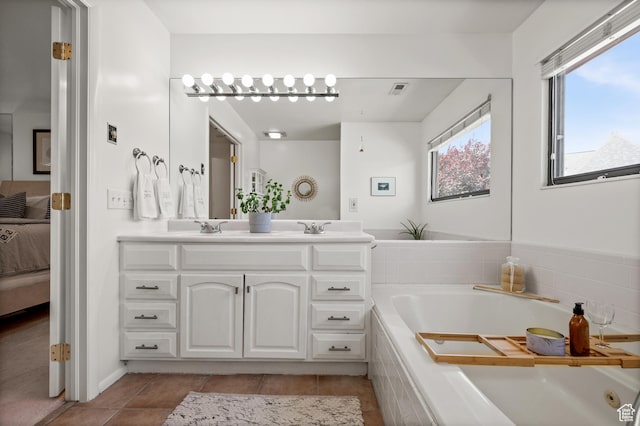 8848 S Willow Hills Ct, Sandy, UT 84093 - ensuite bathroom with double vanity, a bath, and tile patterned floors