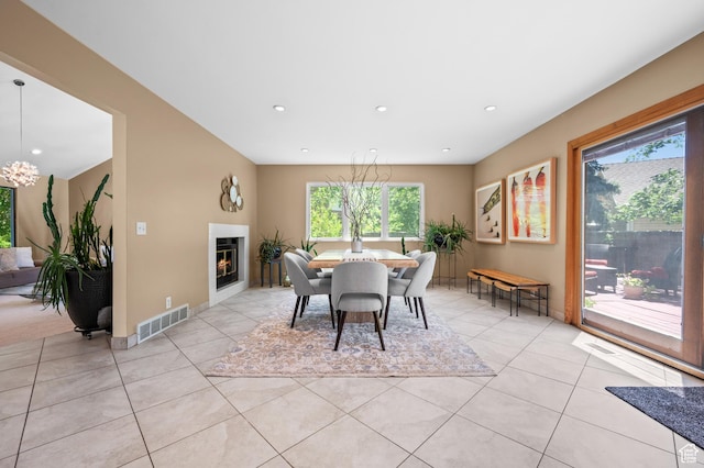 8848 S Willow Hills Ct, Sandy, UT 84093 - dining space featuring light tile patterned floors, recessed lighting, baseboards, and a glass covered fireplace