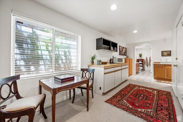 8848 S Willow Hills Ct, Sandy, UT 84093 - kitchen featuring white microwave, light colored carpet, recessed lighting, and light countertops