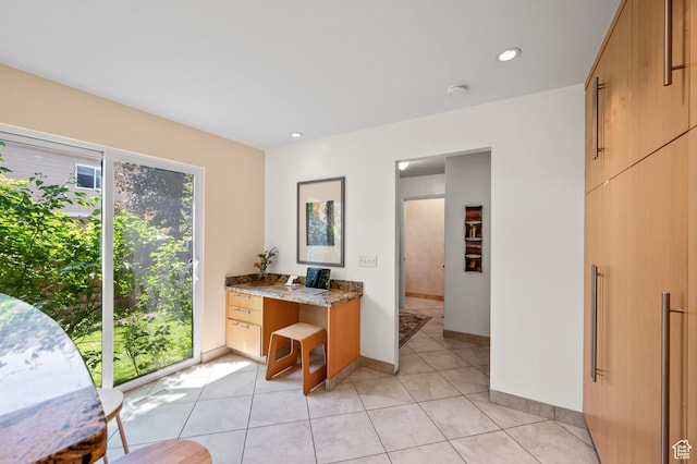 8848 S Willow Hills Ct, Sandy, UT 84093 - kitchen featuring light stone counters, light tile patterned floors, recessed lighting, and baseboards