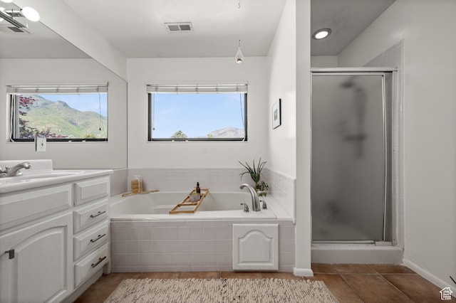 8848 S Willow Hills Ct, Sandy, UT 84093 - full bath featuring vanity, a stall shower, a bath, and tile patterned flooring