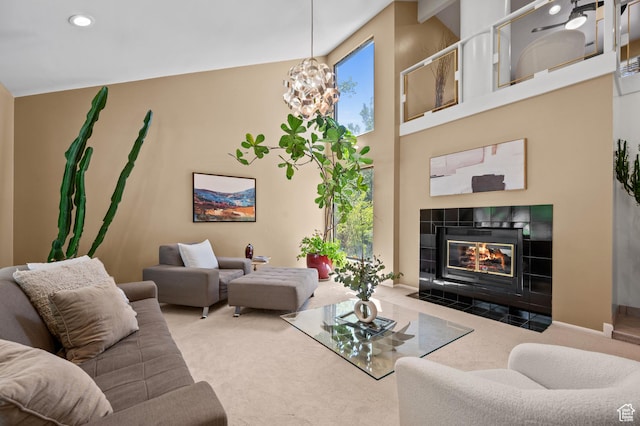 8848 S Willow Hills Ct, Sandy, UT 84093 - living area featuring carpet flooring, a tile fireplace, a chandelier, recessed lighting, and baseboards