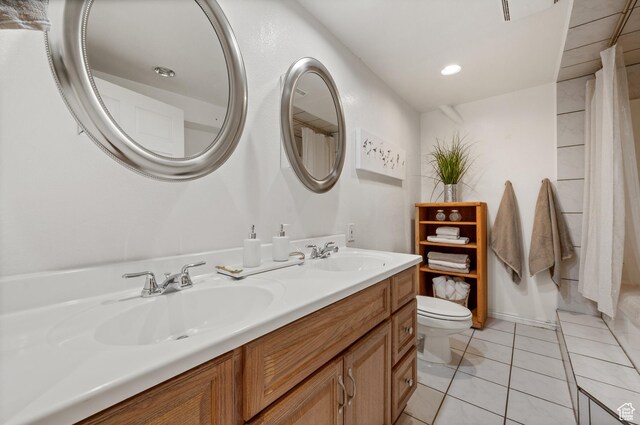 8848 S Willow Hills Ct, Sandy, UT 84093 - bathroom featuring toilet, double vanity, and tile patterned floors
