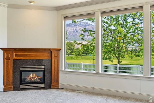 3524 N 3000 W, Farr West, UT 84404 - unfurnished living room with carpet flooring, a premium fireplace, and ornamental molding
