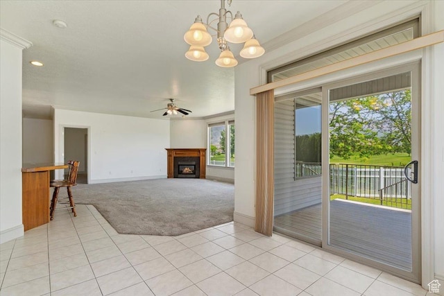 3524 N 3000 W, Farr West, UT 84404 - unfurnished living room with light carpet, baseboards, ceiling fan, a lit fireplace, and light tile patterned floors