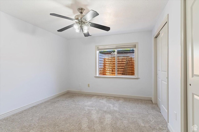 3524 N 3000 W, Farr West, UT 84404 - unfurnished bedroom featuring carpet, a closet, baseboards, and ceiling fan