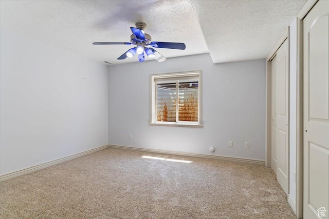 3524 N 3000 W, Farr West, UT 84404 - unfurnished bedroom featuring carpet floors, a textured ceiling, baseboards, a closet, and a ceiling fan