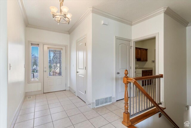 3524 N 3000 W, Farr West, UT 84404 - entrance foyer featuring a chandelier, ornamental molding, baseboards, and light tile patterned floors