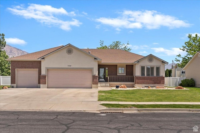 3524 N 3000 W, Farr West, UT 84404 - single story home featuring a garage, driveway, and stucco siding