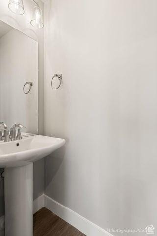 535 W 2530 N Unit 6-10, Cedar City, UT 84721 - bathroom with baseboards and wood finished floors