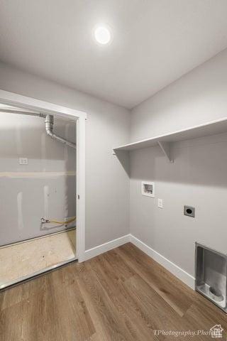 535 W 2530 N Unit 6-10, Cedar City, UT 84721 - laundry room with washer hookup, baseboards, and wood finished floors