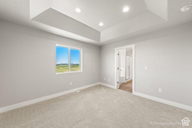 535 W 2530 N Unit 6-10, Cedar City, UT 84721 - spare room with a tray ceiling, light colored carpet, baseboards, and recessed lighting