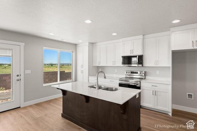 535 W 2530 N Unit 6-10, Cedar City, UT 84721 - kitchen featuring stainless steel appliances, a sink, plenty of natural light, white cabinetry, and recessed lighting