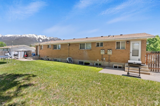 285 N 300 W, Orem, UT 84057 - back of property with a mountain view and a patio area