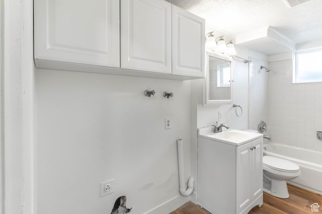 285 N 300 W, Orem, UT 84057 - bathroom featuring vanity, shower / bathtub combination, toilet, and wood finished floors