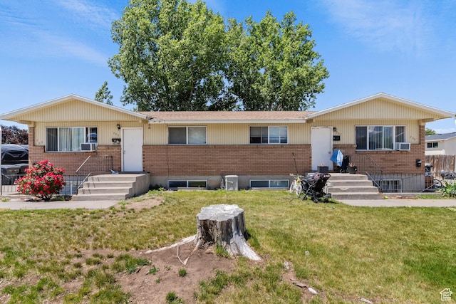 285 N 300 W, Orem, UT 84057 - single story home featuring brick siding, a front yard, and cooling unit