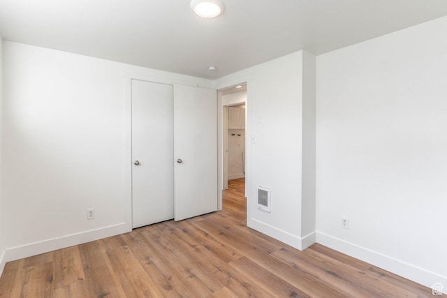 285 N 300 W, Orem, UT 84057 - unfurnished bedroom with baseboards, wood finished floors, and a closet