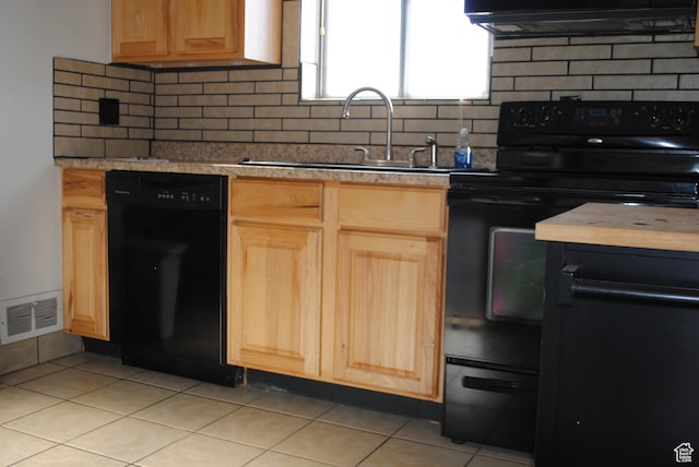 5890 S 2625 W, Roy, UT 84067 - kitchen with black appliances, light brown cabinets, a sink, and light tile patterned flooring