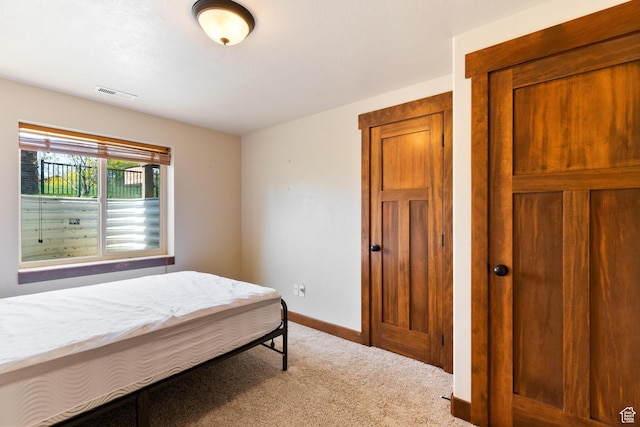 2029 S Cottage Ln, Garden City, UT 84028 - bedroom featuring carpet floors and baseboards