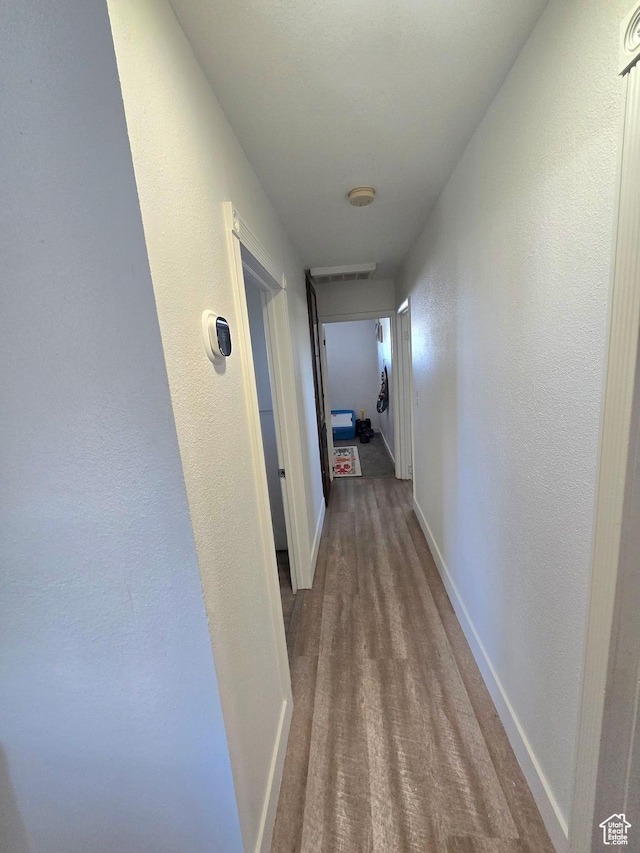 1191 N Geneva Rd, Provo, UT 84601 - hallway featuring baseboards and a textured wall