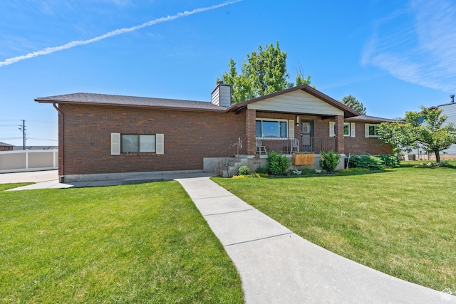 1265 W 1625 S, Syracuse, UT 84075 - single story home with brick siding, a porch, a chimney, and a front yard