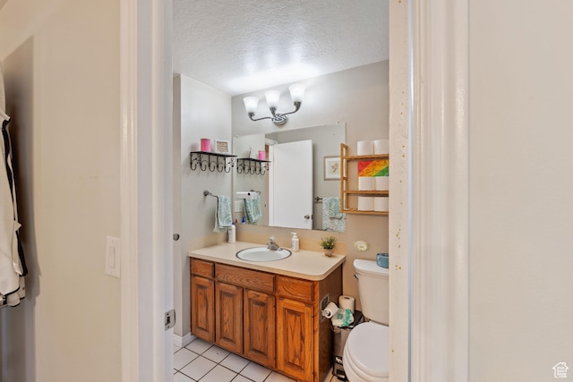 1265 W 1625 S, Syracuse, UT 84075 - bathroom featuring toilet, a textured ceiling, vanity, and tile patterned flooring