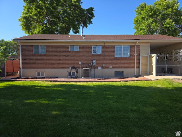 1549 W Marty Cir W, West Jordan, UT 84084 - back of house featuring brick siding
