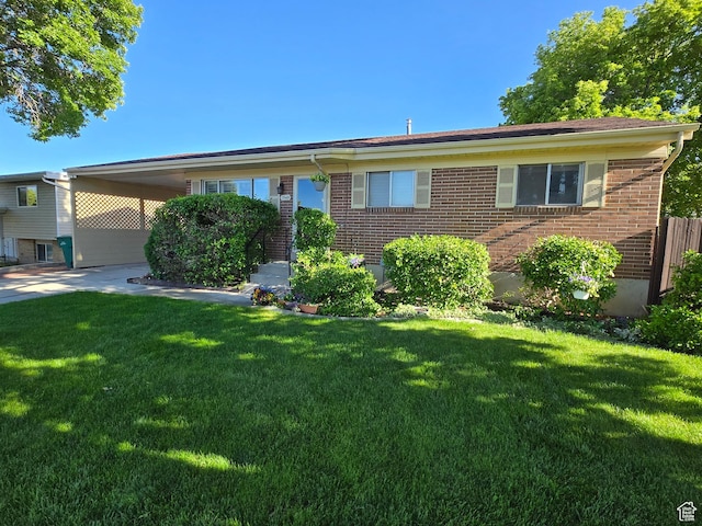1549 W Marty Cir W, West Jordan, UT 84084 - single story home featuring brick siding, a front lawn, and driveway