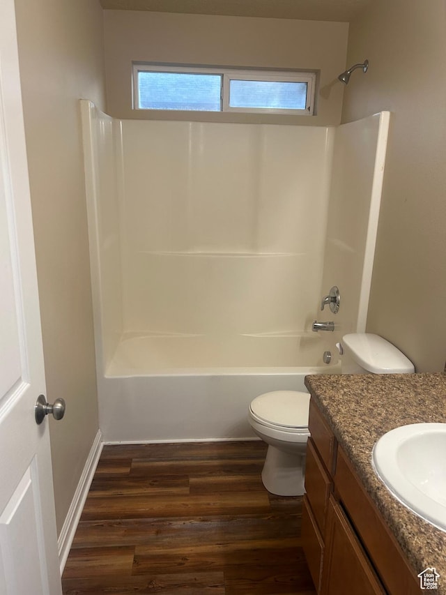 4673 W Greensand Dr, West Jordan, UT 84084 - bathroom with toilet, wood finished floors, vanity, and shower / bathtub combination