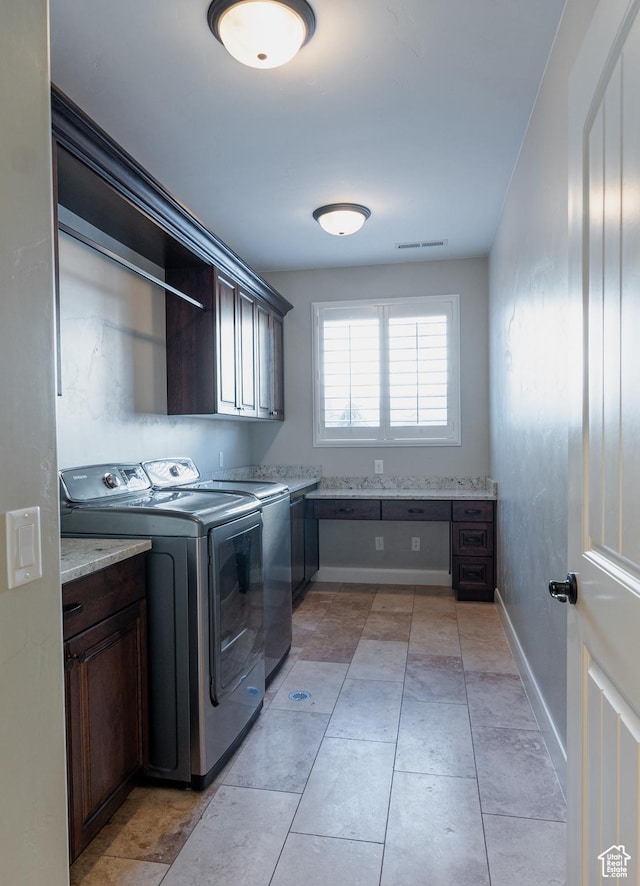 3288 W 2570 S, Hurricane, UT 84737 - laundry area with cabinet space, separate washer and dryer, baseboards, and light tile patterned flooring