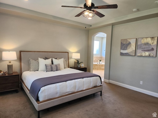 3288 W 2570 S, Hurricane, UT 84737 - bedroom featuring arched walkways, carpet floors, ensuite bath, baseboards, and ceiling fan