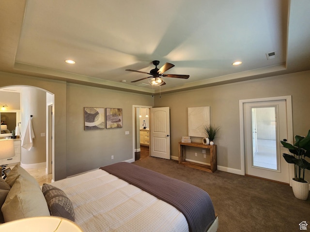 3288 W 2570 S, Hurricane, UT 84737 - carpeted bedroom with a raised ceiling, arched walkways, baseboards, recessed lighting, and ceiling fan