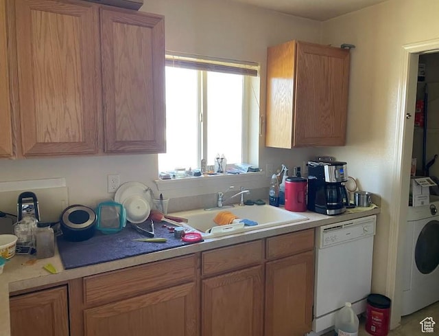 448 Alamo St, Chubbuck, ID 83202 - kitchen with white dishwasher, washer / dryer, a sink, and light countertops