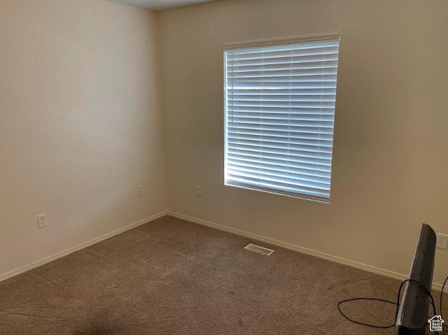448 Alamo St, Chubbuck, ID 83202 - carpeted empty room featuring baseboards