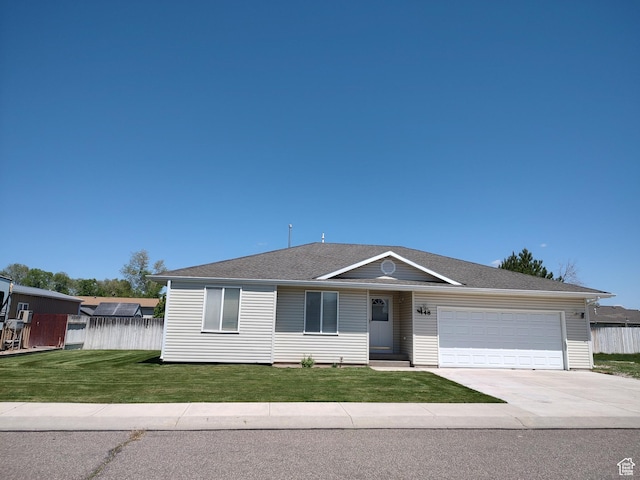 448 Alamo St, Chubbuck, ID 83202 - ranch-style house featuring an attached garage, concrete driveway, and a shingled roof